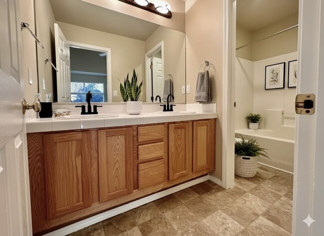 Building Photo - The Townhome That Ticks Every Box: Space, Privacy, and Location! **$500 OFF 2ND FULL MONTH'S RENT**