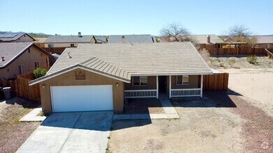 Building Photo - Wow must see 4 bedroom Plus 2 bath Home in...