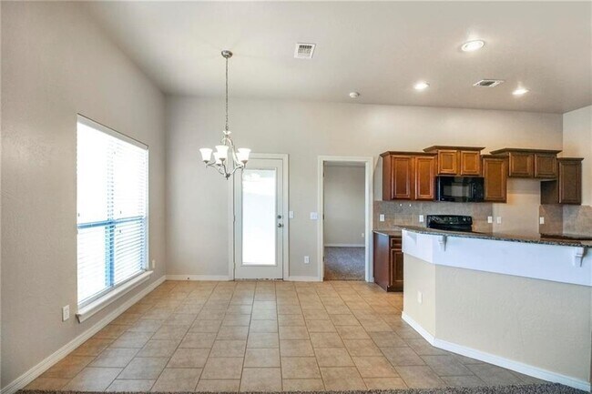 Building Photo - Beautiful 4 + Bedroom Home in Gated North ...
