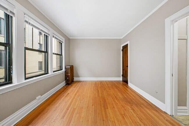 Building Photo - Sunny, Convertible Studio with Two Rooms a...