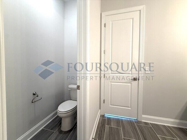 Building Photo - Elegant 4-Bed / 3.5-Bath Home with Main-Level Primary Suite, Quartz Kitchen & 3-Car Garage – In H...