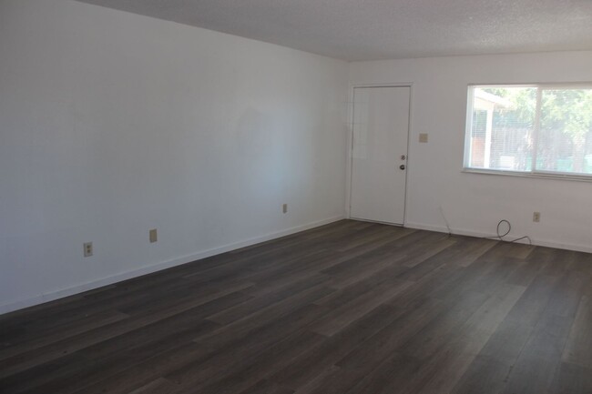 Building Photo - Back On the Rental Market 2 Bedroom Tri-Pl...