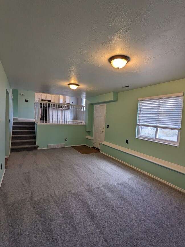 Building Photo - $1,800 Rent Credit! Spacious 5-Bed Clearfield Home with Garage & Fenced Yard