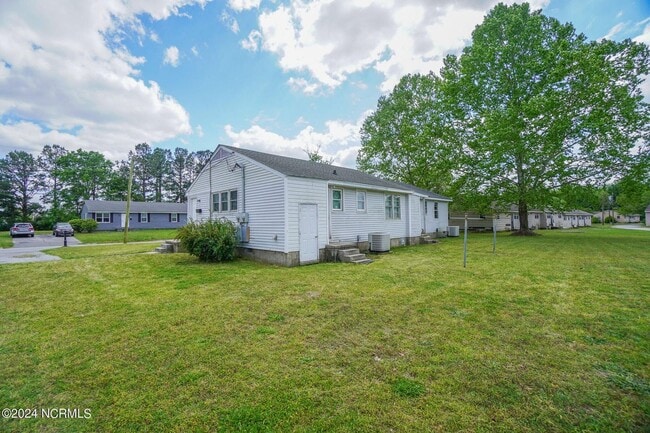 Building Photo - Lawn Care Included in Jville City Limits!