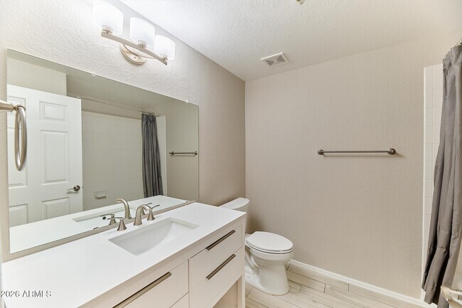 Building Photo - 9555 E Raintree Dr