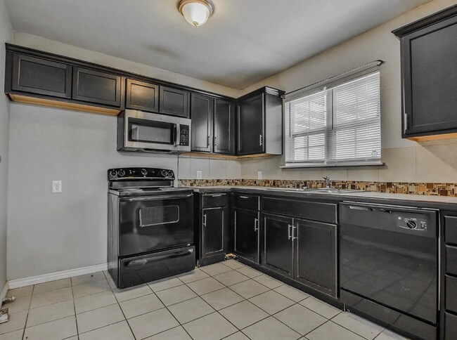 Building Photo - Cute 4 Bedroom close to Texas Tech