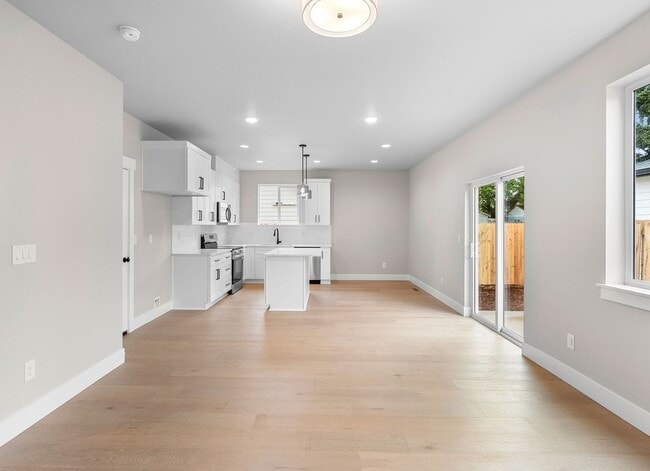 Building Photo - Brand-New 4-Bedroom Home Offering Modern Design, High-End Finishes, Attached Garage & Private Bac...