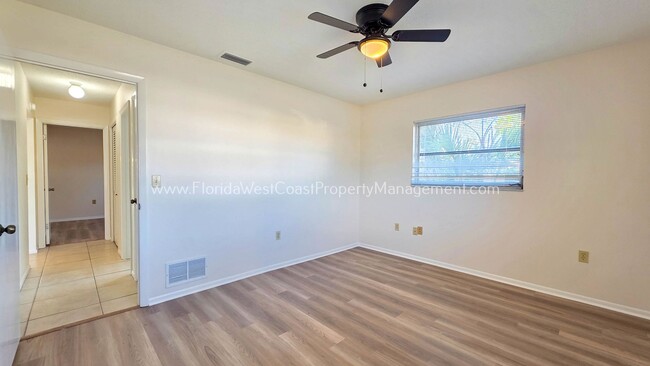 Building Photo - SPACIOUS SARASOTA HOME WITH LARGE FENCED YARD! MOVE IN READY! ALL TILE/ NEW LVP!