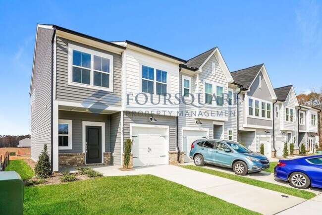 Building Photo - Stylish End-Unit Townhome with Patio & One Car Garage  – Crescent Mills, Clayton