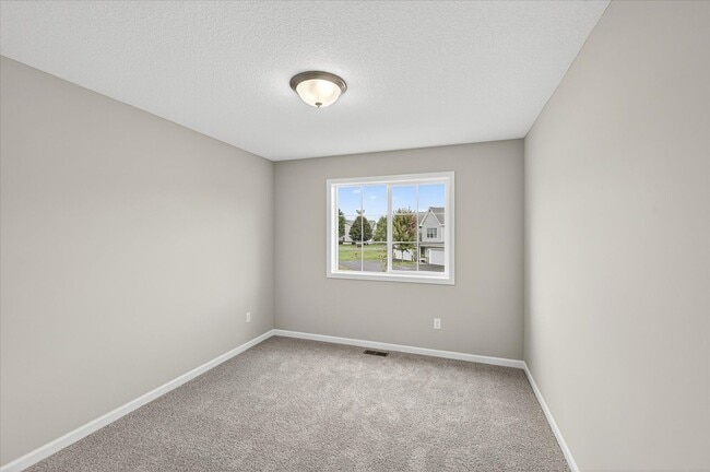 Building Photo - New construction end-unit townhome in Zimm...