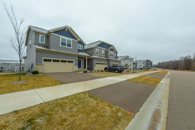 Building Photo - Awesome maple grove 5 bed 4 bath townhome! Pond views, 2 years old!