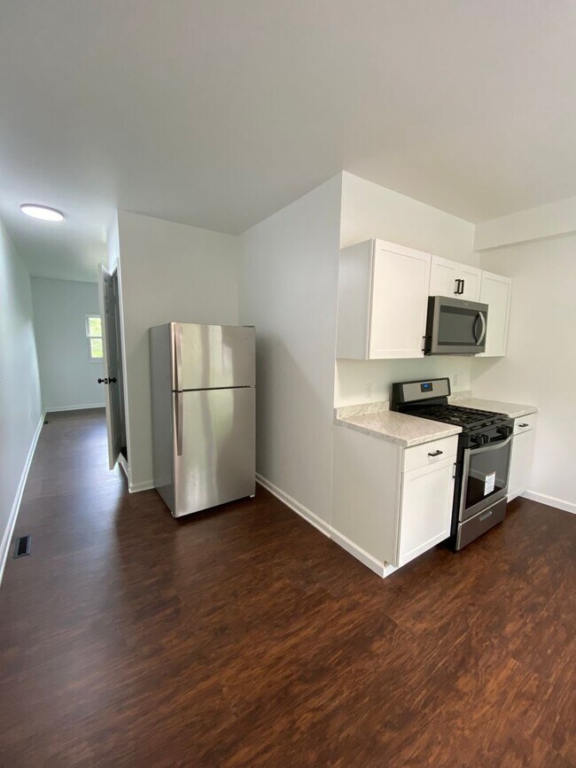 Building Photo - Available July 2026 - Completely renovated 3 bedroom home!