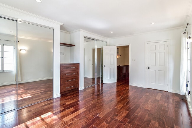 Primary bedroom closets with built in drawers - 8459 W 4th St