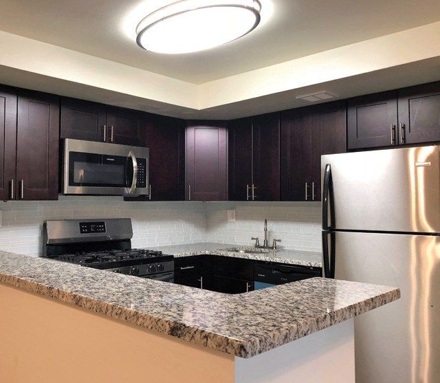 New kitchen - Woodbourne Apartments