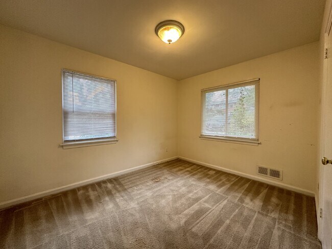 Building Photo - This classic brick rambler, located just around the corner from the West Falls Church Metro Stati...