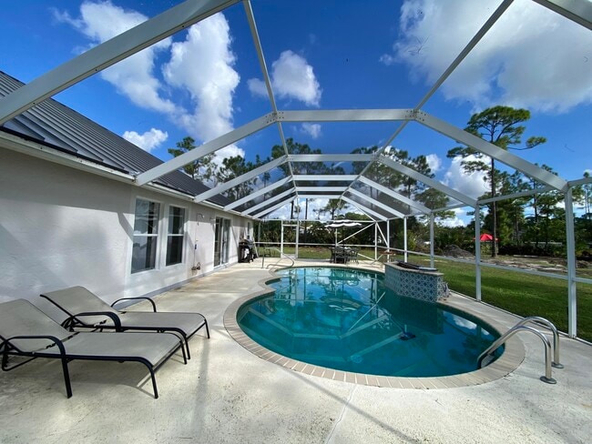 Building Photo - 6302 Royal Palm Beach Blvd