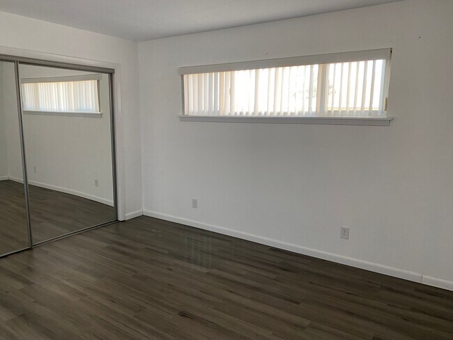 Building Photo - NE BRICK 3 Bedroom 2 Bath 2/CG