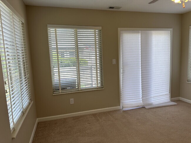 Building Photo - Well-Maintained Condo with 2 Bonus Rooms & Attached 2-Car Garage