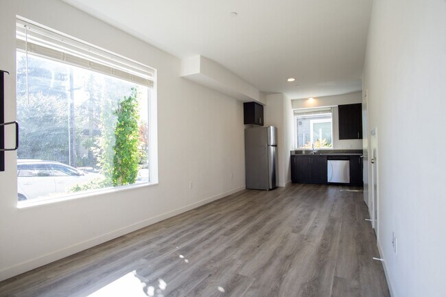 Building Photo - INCREDIBLE SPECIALS: Stylish 2-Bedroom Tow...