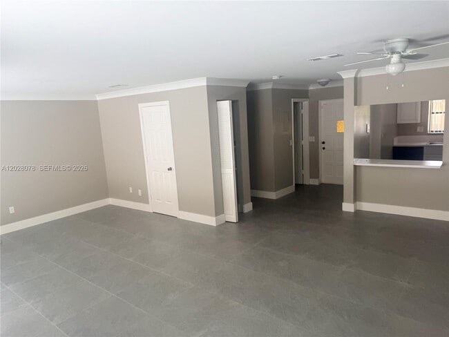 Building Photo - 10787 Royal Palm Blvd