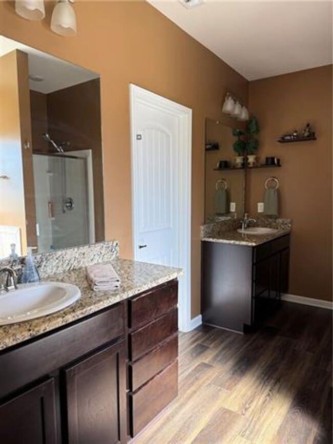 Building Photo - Welcome home to this **beautiful 4-bedroom, 2-bath rental
