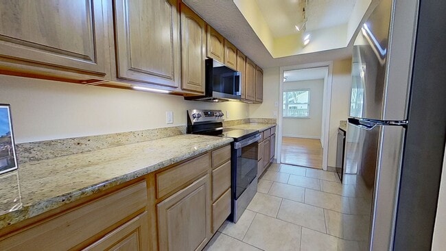 Building Photo - Beautiful Two-Story Home in Neptune Beach availabe early May!