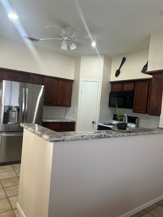 Building Photo - 10907 Spring Harvest Dr