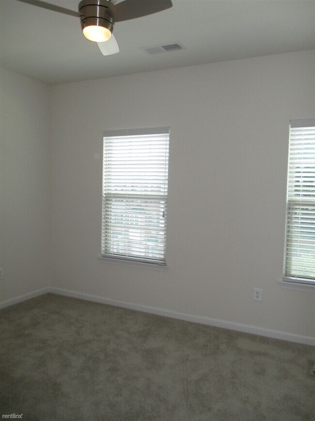Building Photo - 2 br, 2.5 bath Townhome - 7731 Duncannon Ln