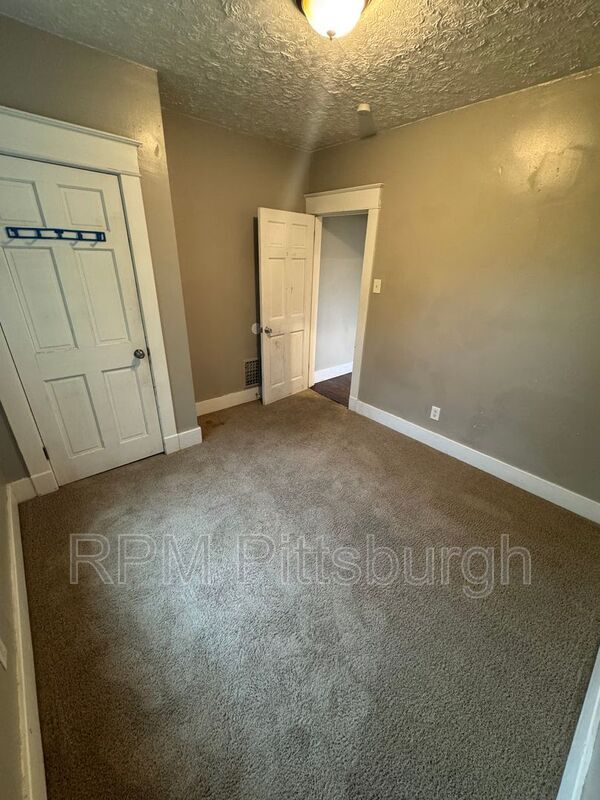 Building Photo - 311-313 W Burgess St