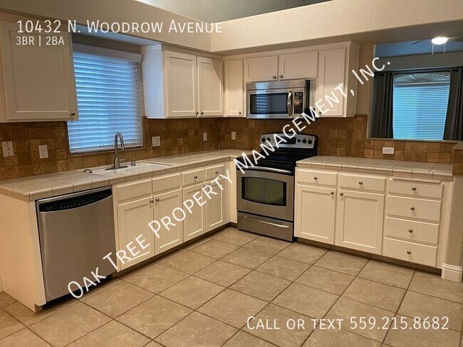 Building Photo - 10432 N Woodrow Ave