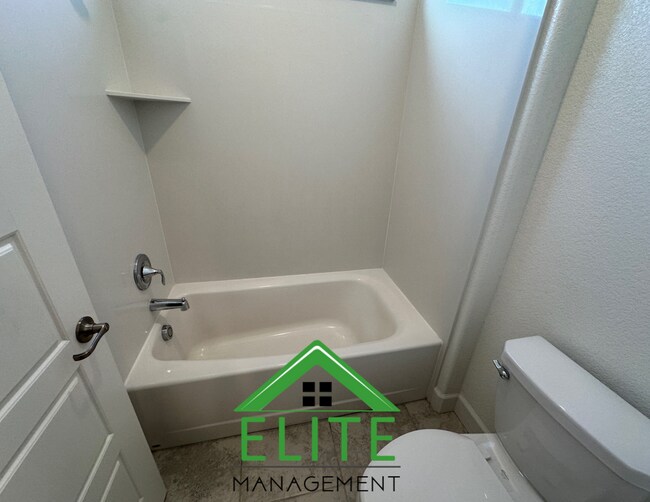 Building Photo - Spacious 5-Bedroom Home with Private In-La...