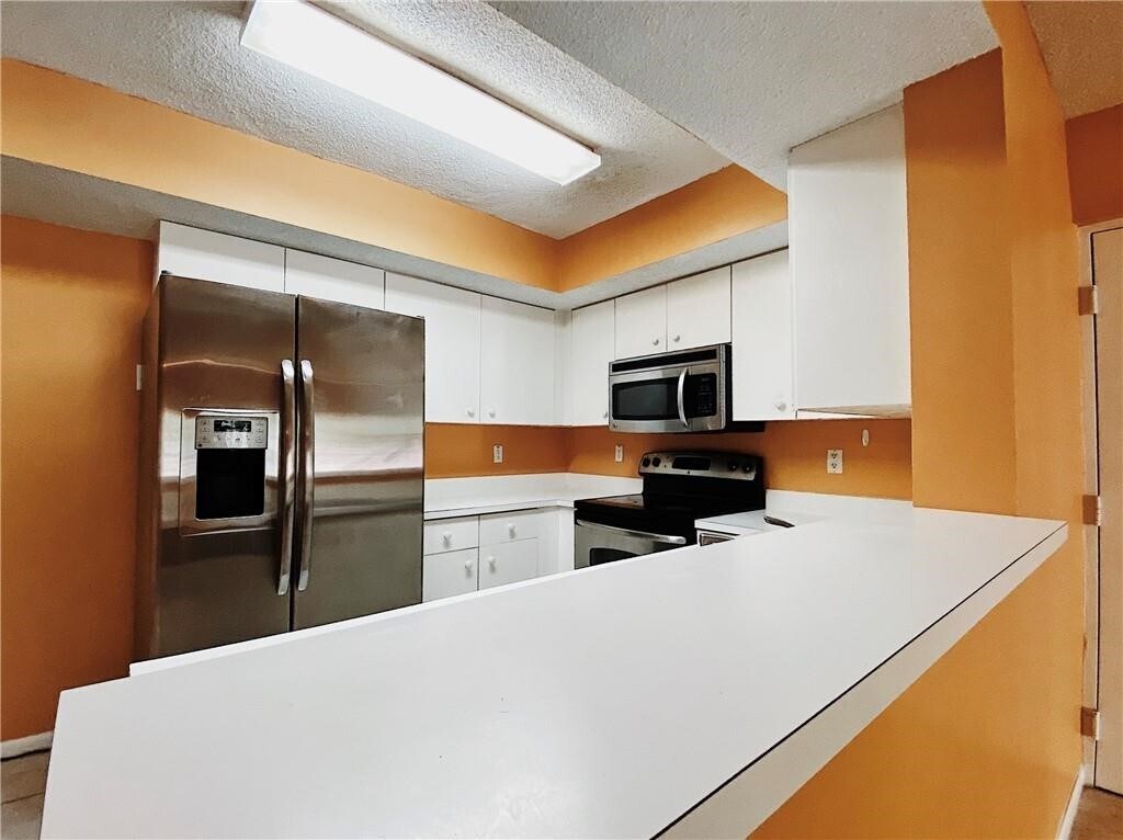 Building Photo - 5580 NW 61st St
