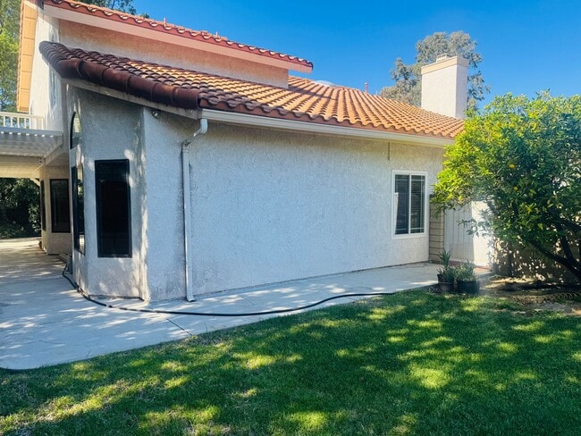 Building Photo - Beautifully Remodeled Lang Ranch Home – Steps from Top-Rated School