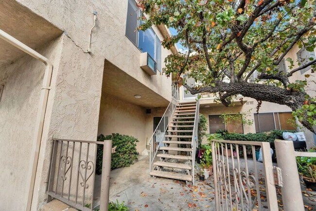 Building Photo - 10743 Palms Blvd.,