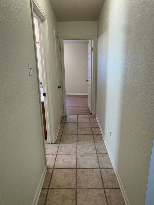 Building Photo - Charming 3-bedroom, 2-bath home offering peaceful country living on just under an acre.