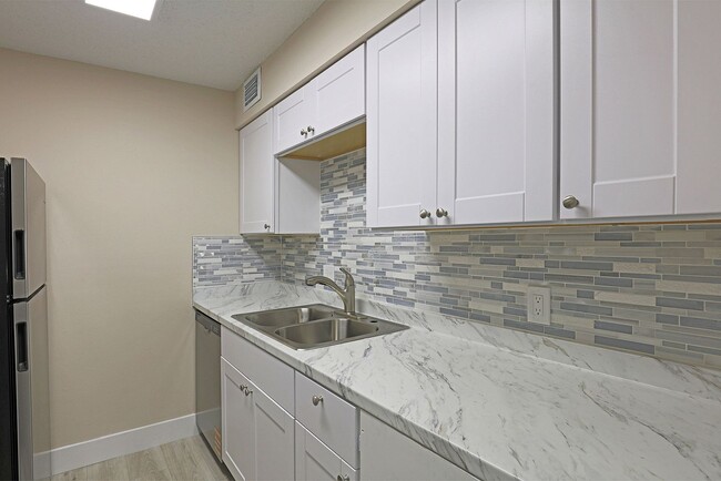 Building Photo - Mystic Gardens 5303-310