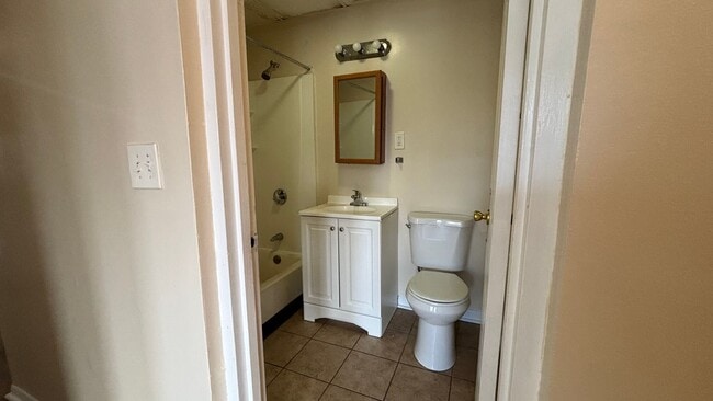 Building Photo - 4 Bedrooms 1.5 Bath Apartment with Heat and Hot Water Included!