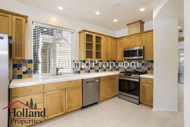 Building Photo - Charming 3-Bedroom Home with Wood Floors, Gas Fireplace & Private Patio
