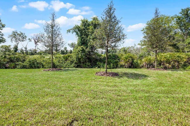 Building Photo - Brand-New 4BR Home with Tile Floors & Quar...