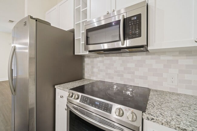 Building Photo - COMING SOON! Modern 1BR/1BA in First Ward – Walk to Parks, Dining & Entertainment