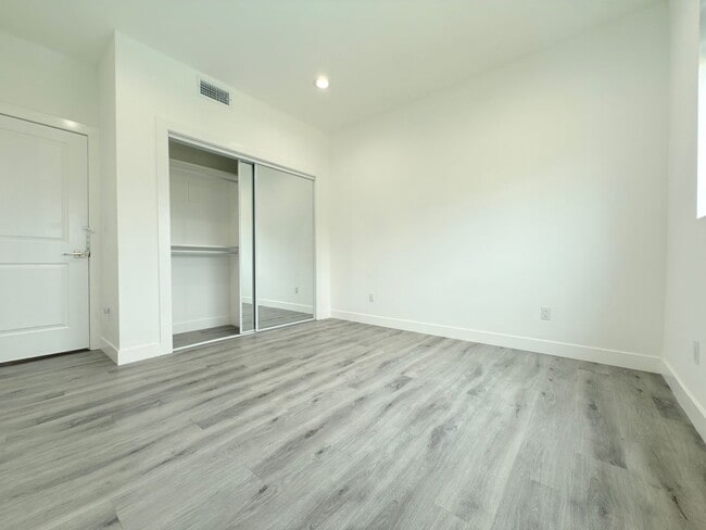 Building Photo - Chic Modern Living in Panorama City – 4 Be...