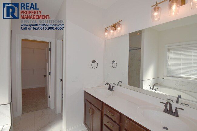 Building Photo - All brick 4 bedroom home plus Bonus room! Garage and covered patio!