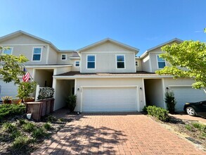 Building Photo - Move in ready 3/2 New Construction Townhou...