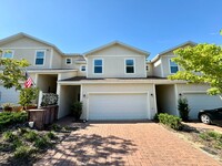 Building Photo - Move in ready 3/2 New Construction Townhou...
