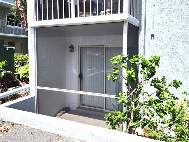 Building Photo - Ground Floor End-Unit; New Paint; All-Tile...