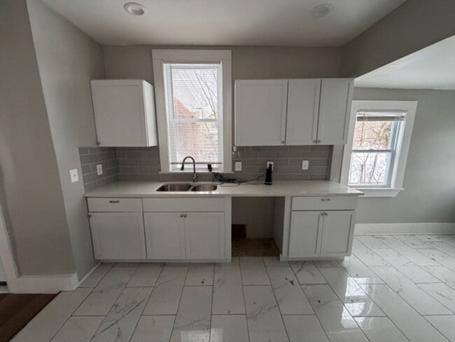 Building Photo - Charming 4-bed, 2-bath brick colonial home Contact KPM Detroit 313-429-3244