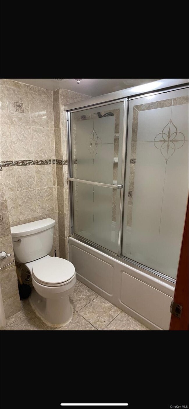 Building Photo - 25-36-36 76th St