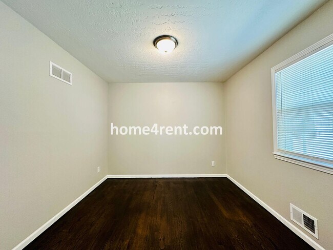 Building Photo - Like New, Ranch Style Home in Raytown - Wood Floors, Finished Basement, Fenced Yard!