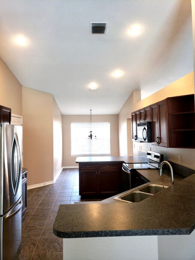 Building Photo - Beautiful home with Swimming Pool in the Hammocks. 4 bedroom 2 bath -Pool lawn service included!!!