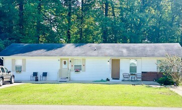 Building Photo - Monthly Paid Rent